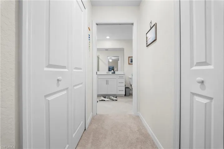between primary bedroom and primary bathroom