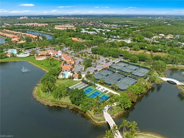 Aerial view of residential area with a large body of water