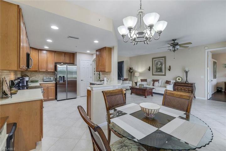 Dining area facing kitchen and grand room