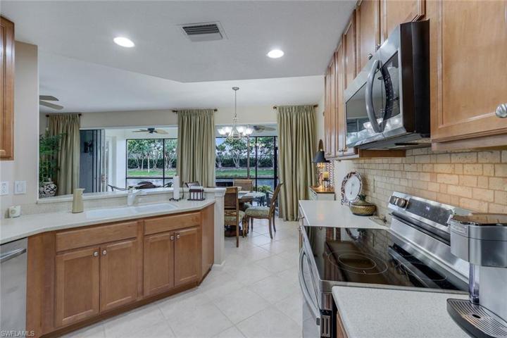 Kitchen facing lanai south facing pond view
