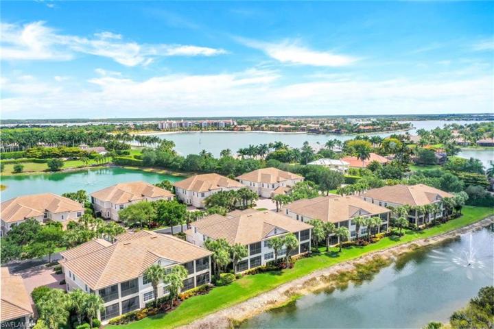 Rear of building showing lakes, beaches and beach club area just short distance away. Easy walk to the club facilities!