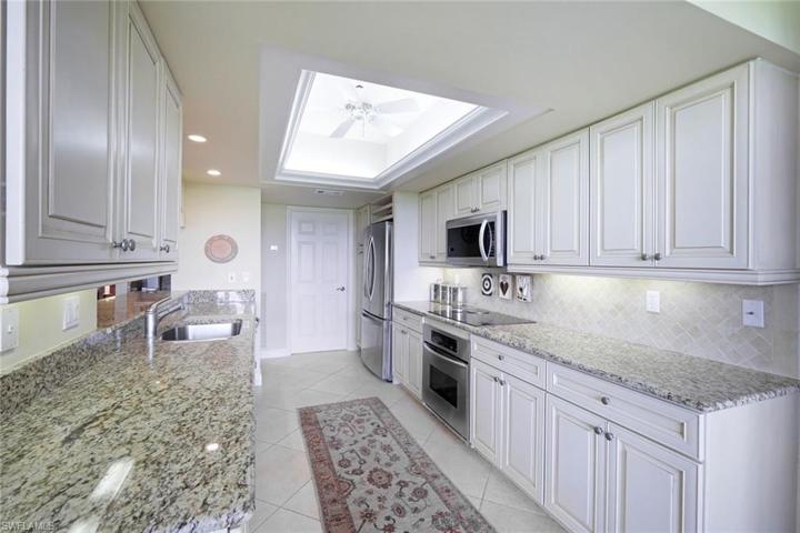 Updated appliances, under cabinet lighting, & separate wet bar. SO MUCH SPACE!