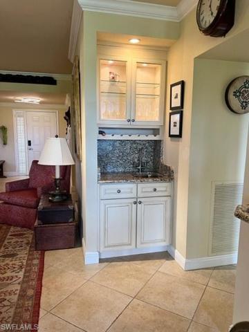 The wet bar will come in handy when guests arrive to relax on the lanai!