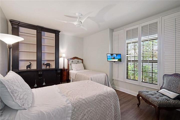 Guest bedroom on western side of home, privately tucked away from the main living space & primary suite.