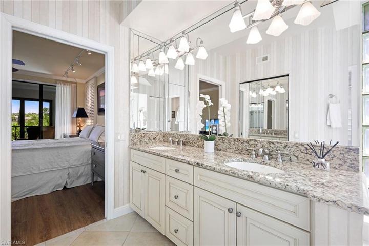 Nicely updated bathroom cabinetry.