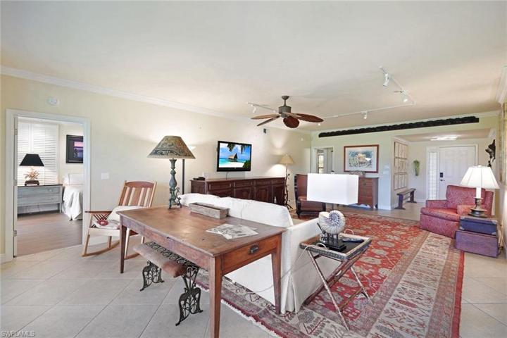 Living, dining and lanai are open to one another, creating an expansive space for family and friends to gather.