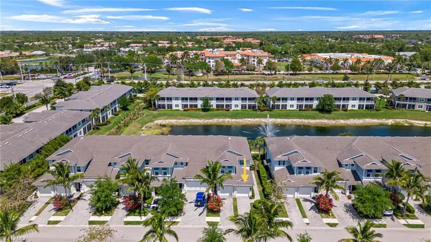 Bird's eye view featuring a water view and a residential view