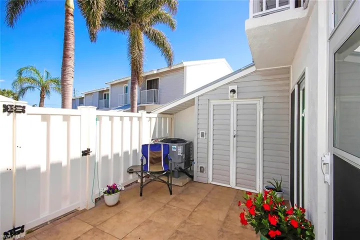 View of patio / terrace featuring fence and a gate