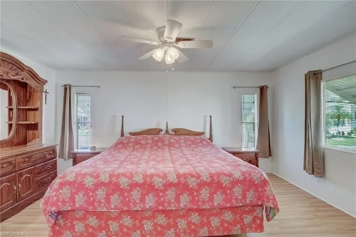 Bedroom featuring light wood-type flooring and ceiling fan