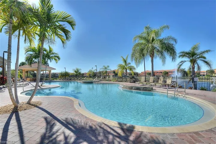 Community pool featuring a patio and a gazebo