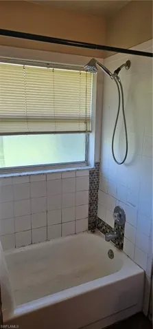 Full bathroom with washtub / shower combination