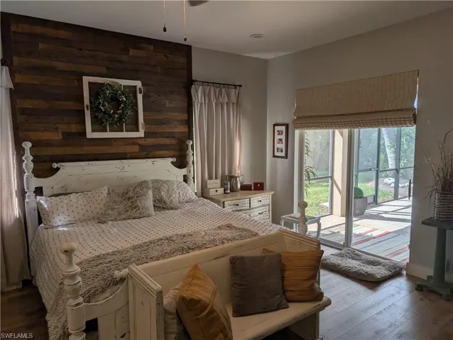 Primary Bedroom with access to outside with 3 closets