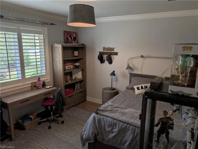 3rd Bedroom featuring plantation shutters