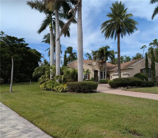 View of front of property featuring a 3 car garage
