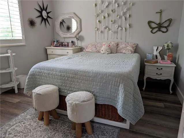 4th Bedroom with hardwood / wood-style floors