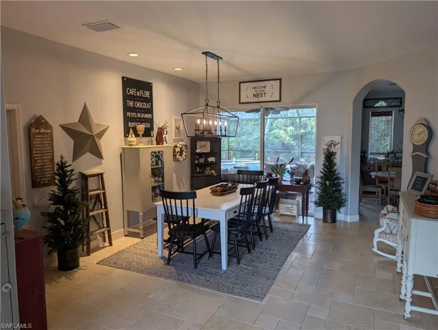 Dining room with an inviting chandelier