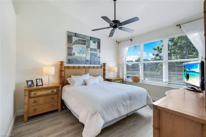 Bedroom featuring light wood-style flooring and ceiling fan