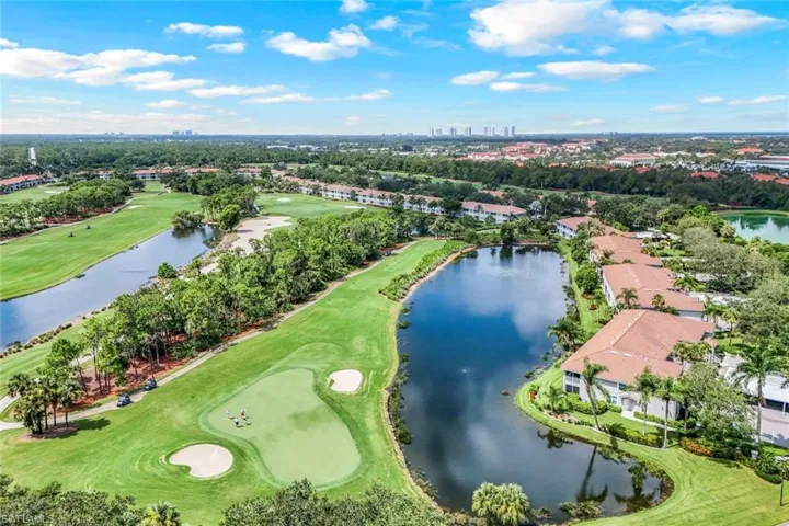 Aerial view of property's location with a local golf course