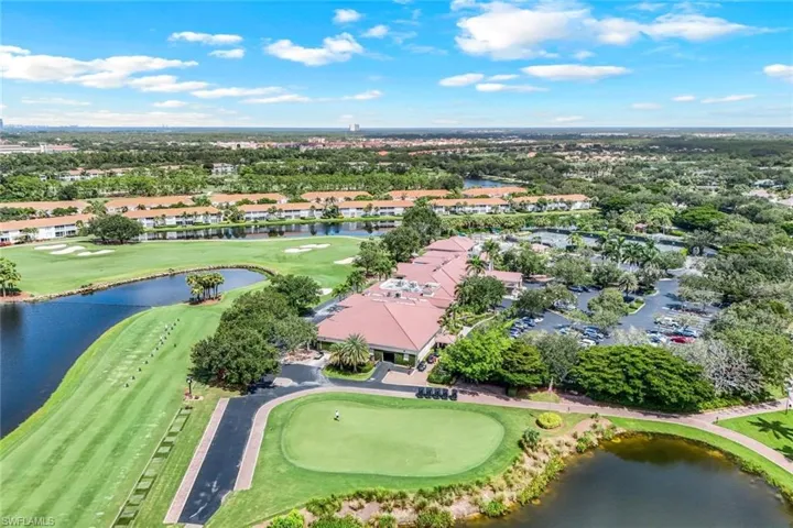 Aerial overview of property's location featuring a large body of water and nearby suburban area
