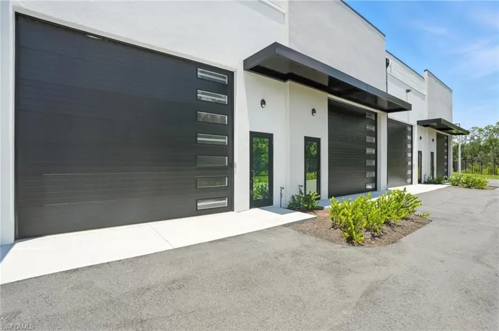 Property entrance with stucco siding