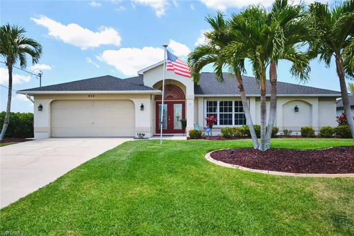 Front of home with flag pole