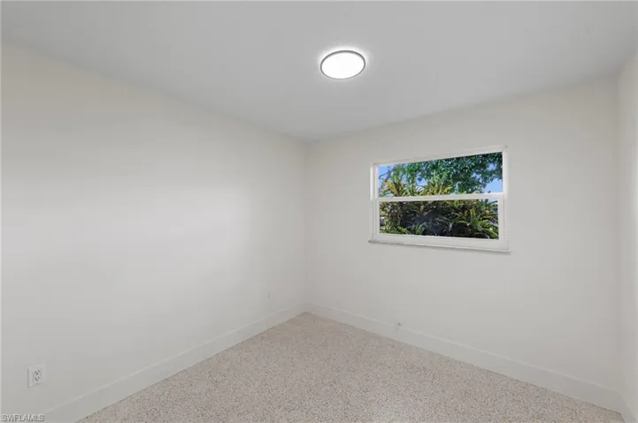 Bedroom with baseboards