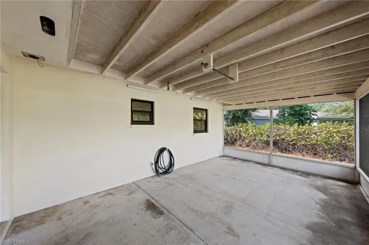 View of patio / terrace with a sunroom