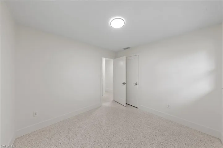 bedroom featuring baseboards