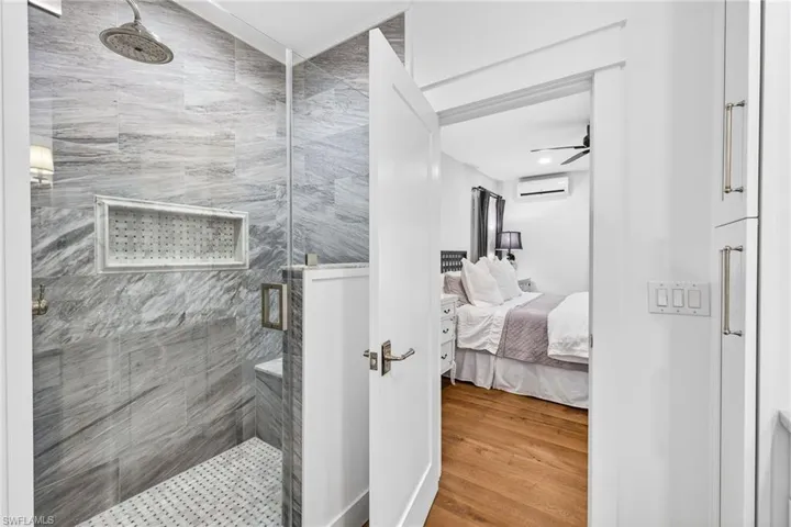New Quartz & marble tile shower & vanities.
