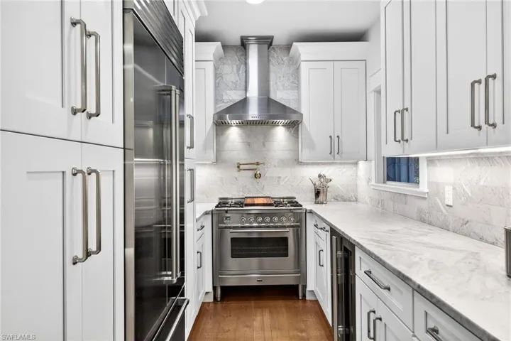 Main House Gourmet kitchen & gas range. SS upgraded applainces