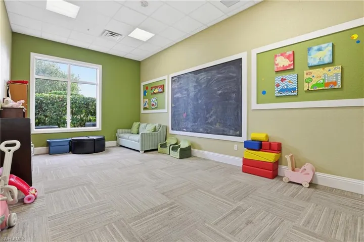 Recreation room with a drop ceiling