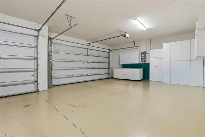 3-Car Garage with built-in shelving