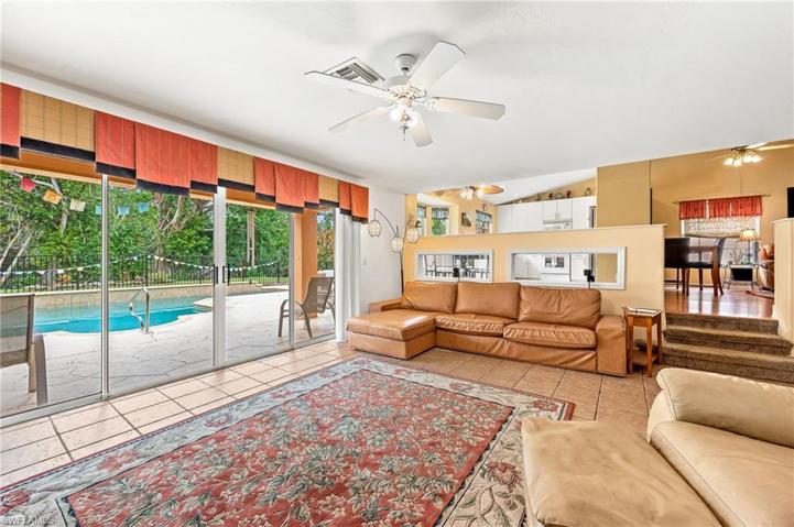 Sunken family room leading out to pool and extented lanai
