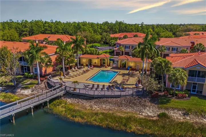Experience breathtaking panoramic sunset views over the pool and surrounding lakes from above.