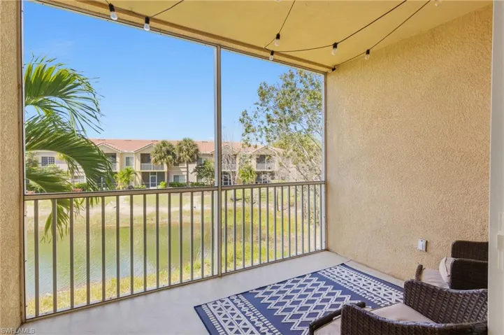 Screened lanai with brand-new screens overlooking peaceful lake views.