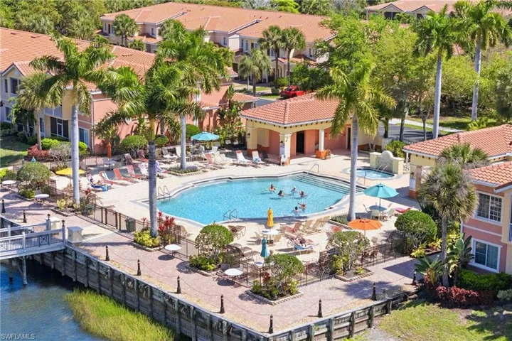 Resort-style pool with new furniture and panoramic views.
