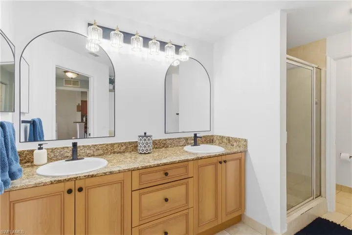 Refreshed primary bath with updated fixtures and clean, modern finishes.