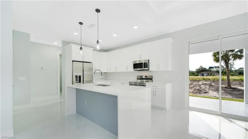 1103  Pine  AVE, Lehigh Acres, FL 33972