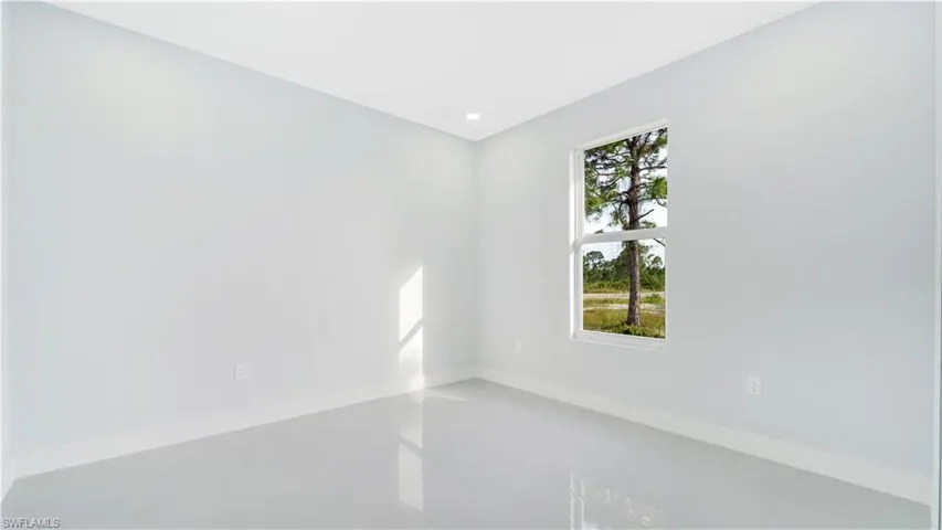 1103  Pine  AVE, Lehigh Acres, FL 33972