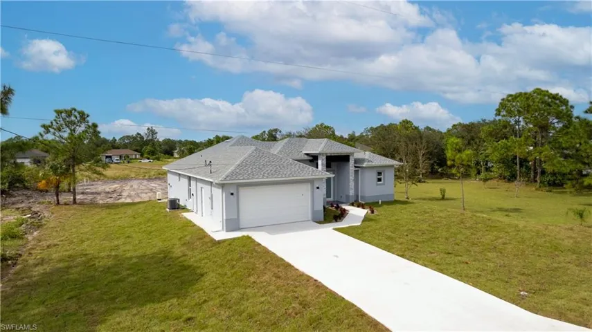 1103  Pine  AVE, Lehigh Acres, FL 33972