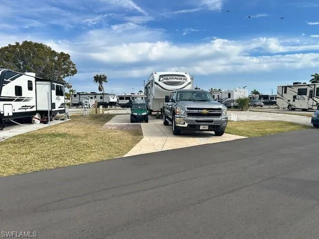 View of asphalt road with a residential view