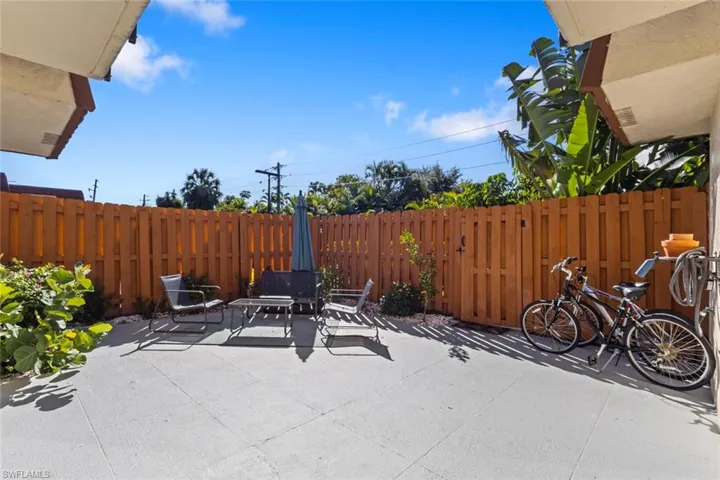 Fenced backyard featuring a patio