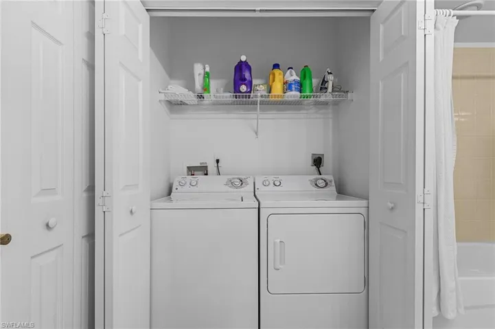 Laundry area closet with washer and dryer.