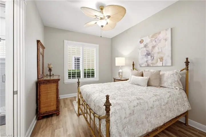 Bedroom 2 with updated flooring shares a Jack and Jill bath with Bedroom 3.