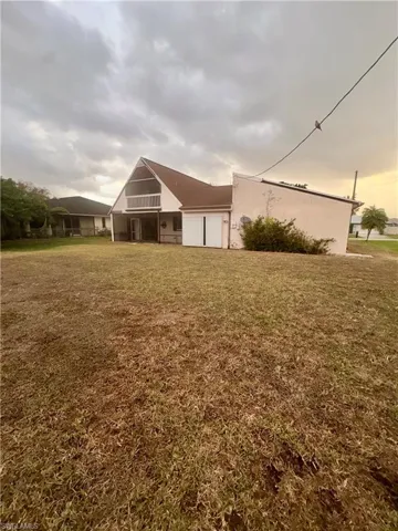 View of back of the home and yard
