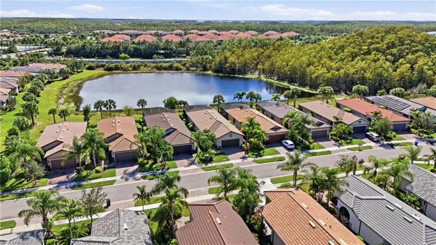 Aerial view of residential area with a nearby body of water