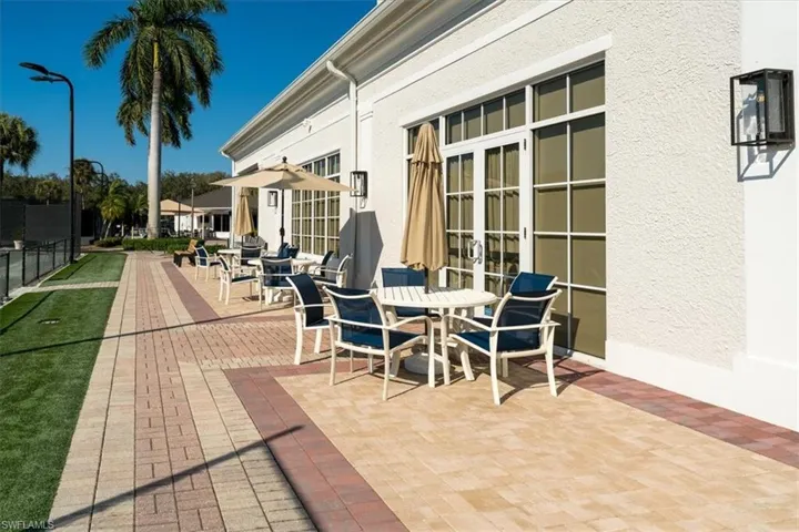 View of patio featuring french doors and outdoor dining space