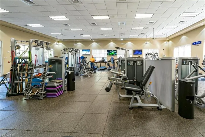 Exercise room with a paneled ceiling
