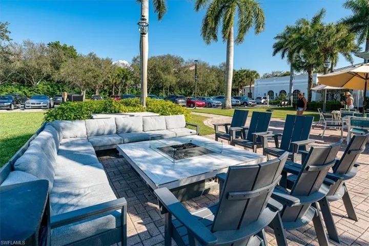 View of patio / terrace featuring an outdoor living space with a fire pit