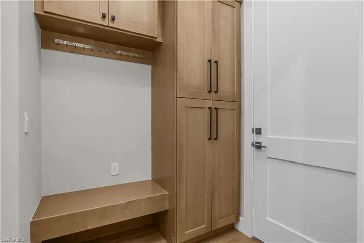 Mudroom with light wood-type flooring